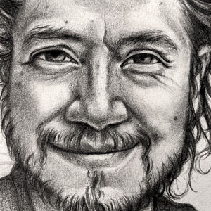 graphite portrait of Yair smiling