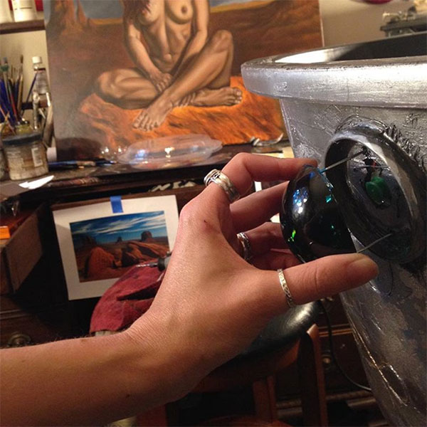 scrying mirror blue moon button being attached to silver bowl