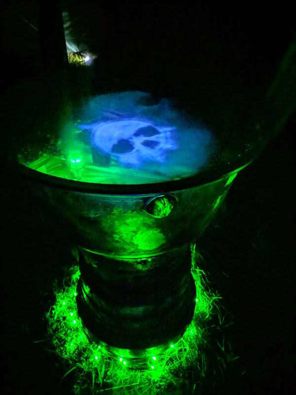 scrying mirror showing a skull vision