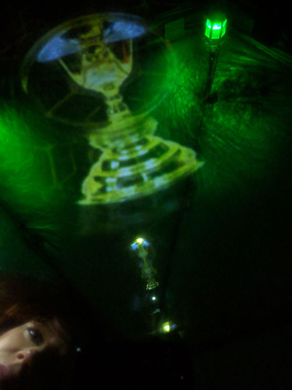 scrying mirror showing a golden chalice vision