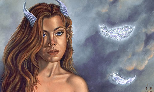 painting of a horned woman on a cliff