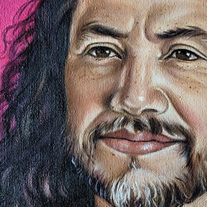 detail of a painting of a handsome man with a beard