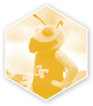 Buzz standing proudly and wearing a protective face mask